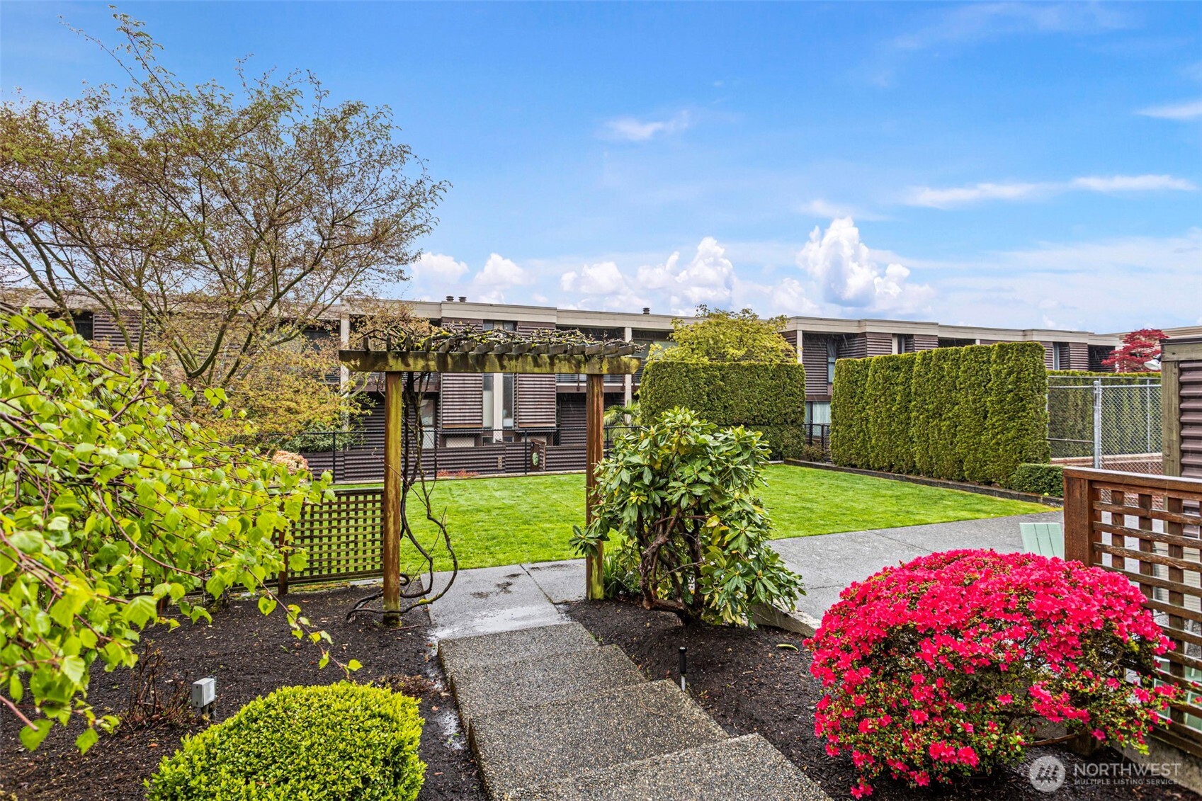 611 State Street, Unit 9 Kirkland, WA 98033 - Photo 36 of 36 a front view of a house with garden