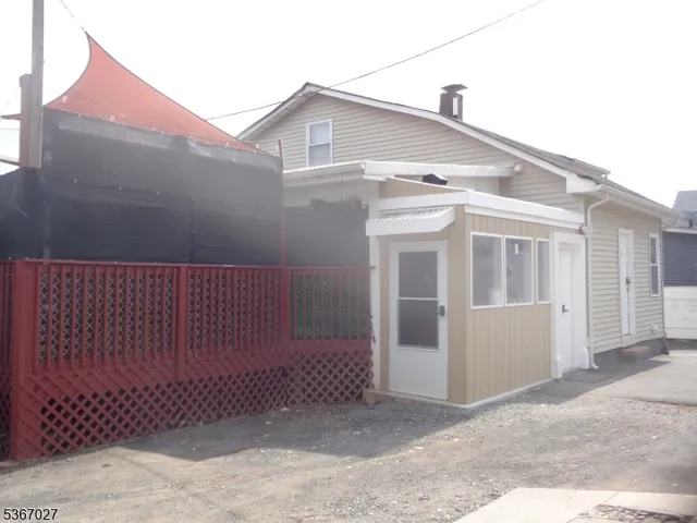 a front view of a house with a garage