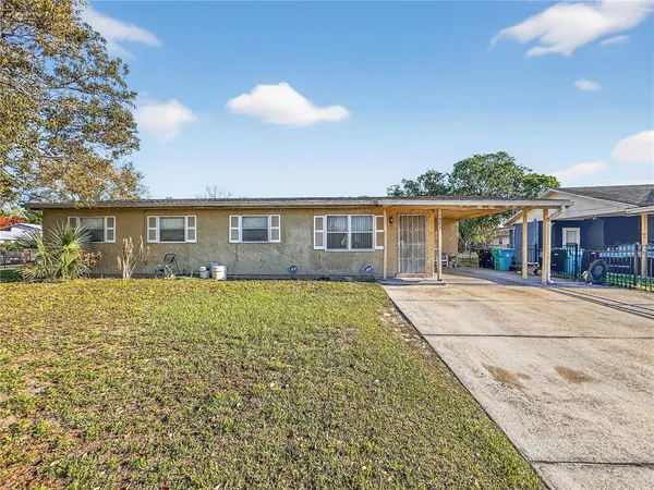 front view of a house with a yard