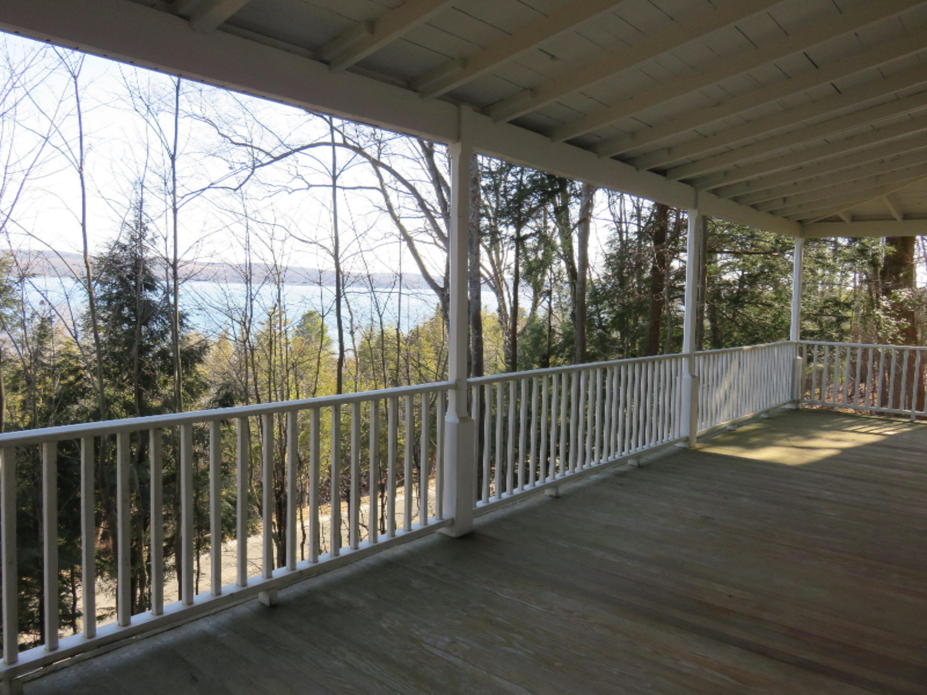 2697 Crescent Beach Road Manistee, MI 49660 - Photo 3 of 45 Expansive Covered Porch