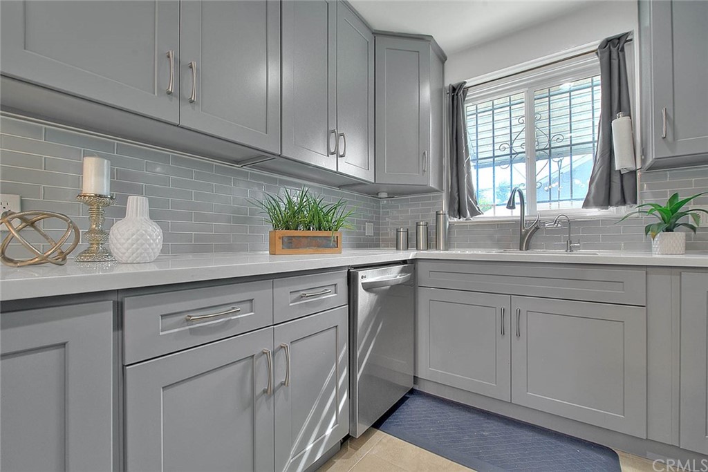 2509 Pine Valley Drive Alhambra, CA 91803 - Photo 19 of 63 a kitchen with appliances cabinets and a window