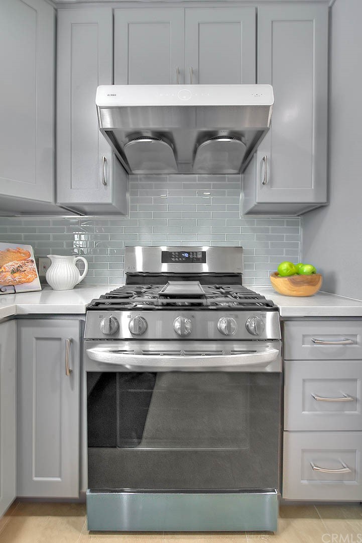 2509 Pine Valley Drive Alhambra, CA 91803 - Photo 21 of 63 a stove top oven sitting inside of a kitchen