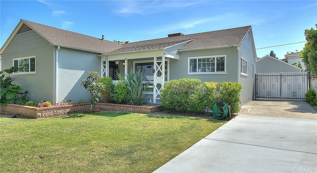 2509 Pine Valley Drive Alhambra, CA 91803 - Photo 3 of 63 a front view of a house with a yard and garage