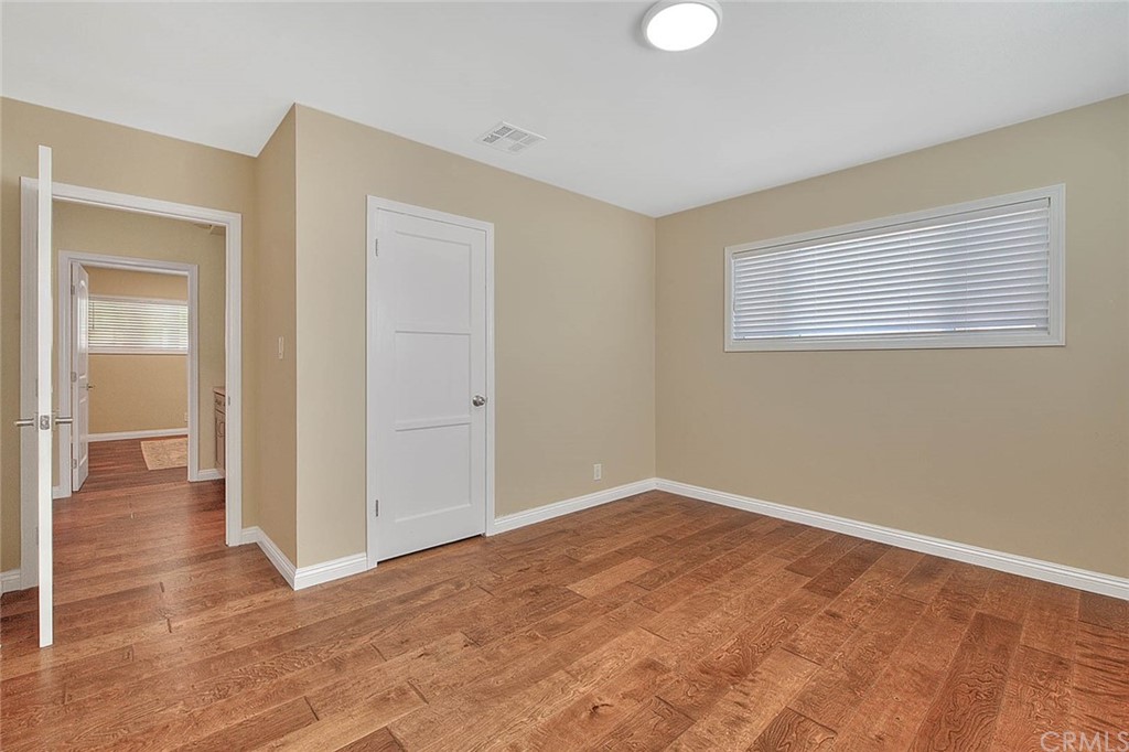 2509 Pine Valley Drive Alhambra, CA 91803 - Photo 37 of 63 a view of an empty room with wooden floor and a window