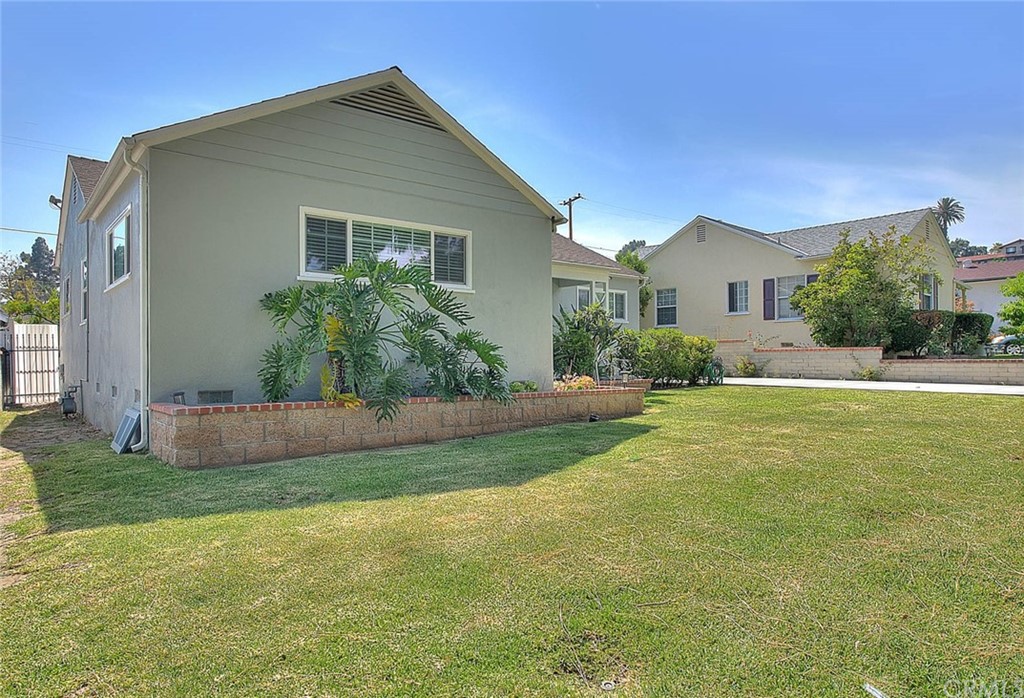 2509 Pine Valley Drive Alhambra, CA 91803 - Photo 60 of 63 a front view of house with yard and green space