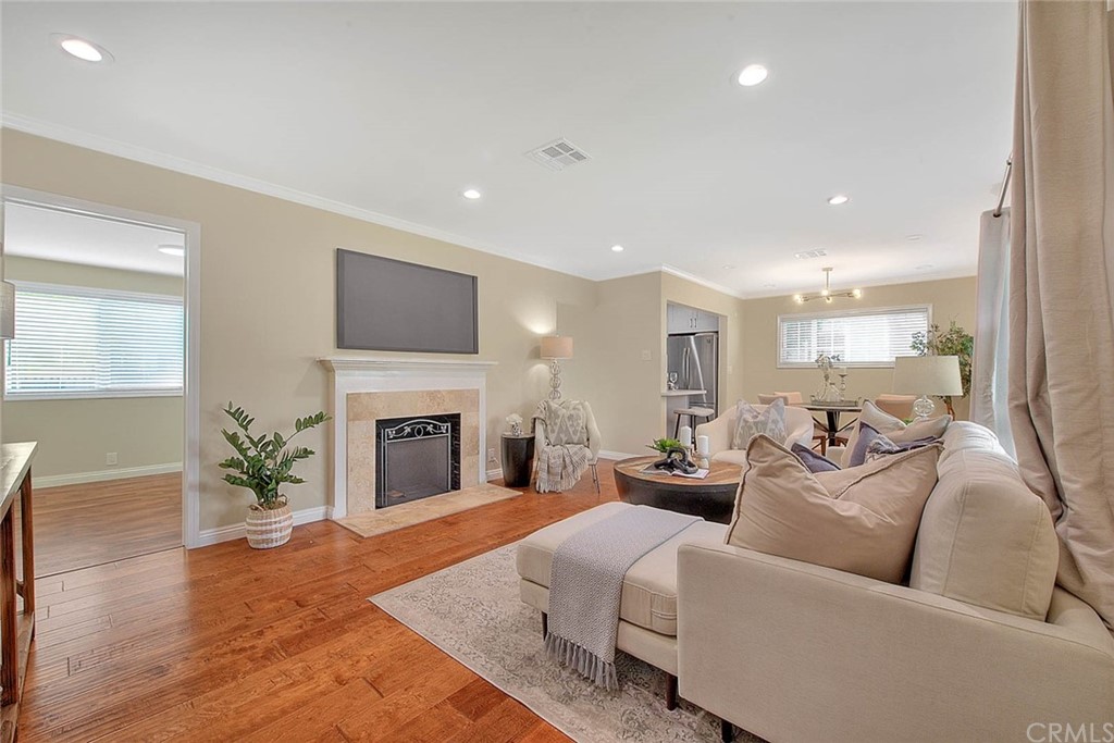 2509 Pine Valley Drive Alhambra, CA 91803 - Photo 9 of 63 a living room with furniture a fireplace with wooden floor