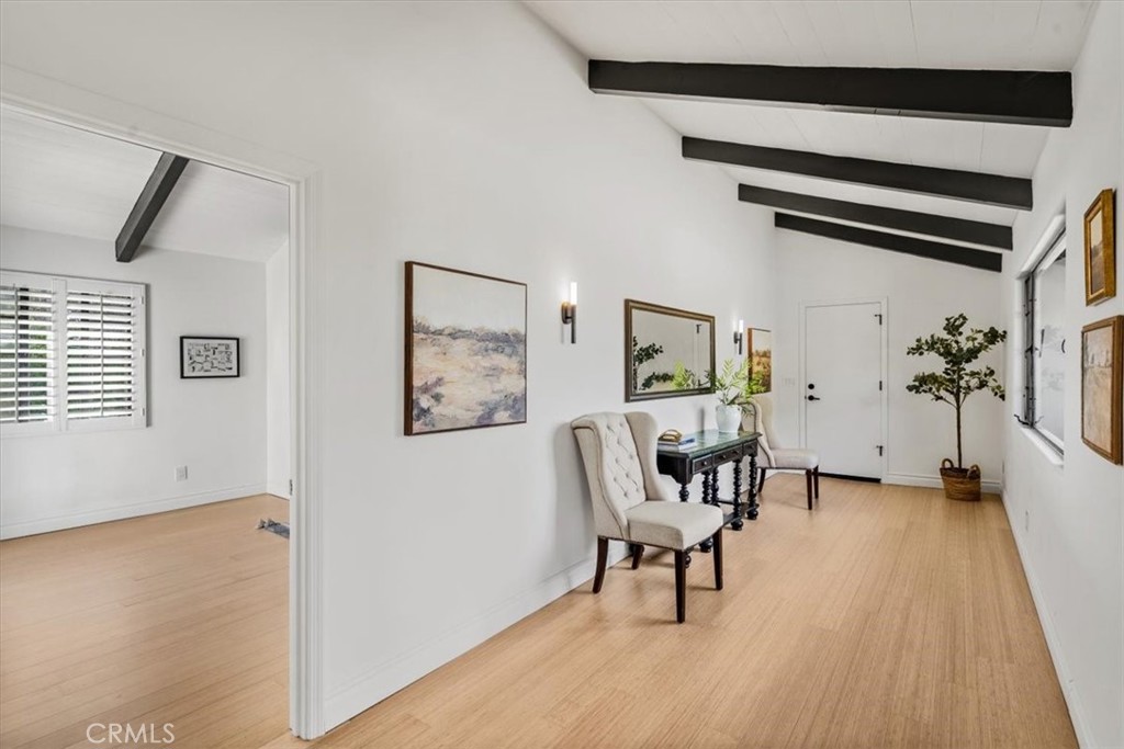 19 Wideloop Road Rolling Hills, CA 90274 - Photo 11 of 35 a living room with furniture and a table
