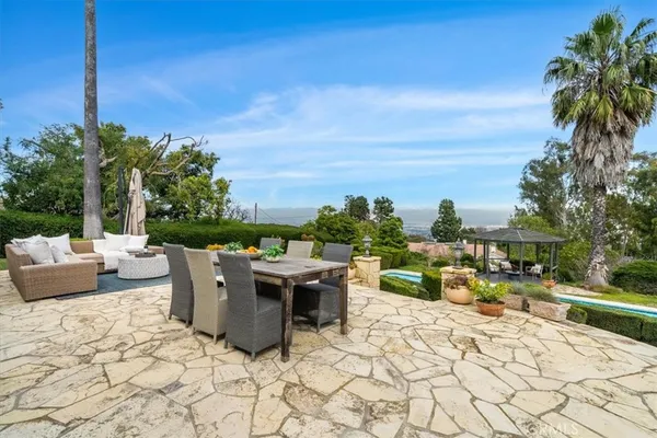 a view of a terrace with furniture