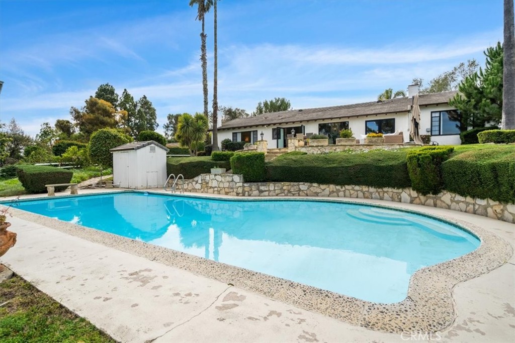 19 Wideloop Road Rolling Hills, CA 90274 - Photo 33 of 35 a view of a house with pool plants and large trees