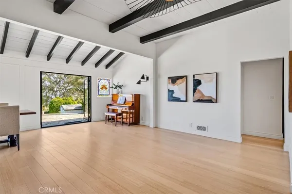 a view of a livingroom with furniture and a fireplace