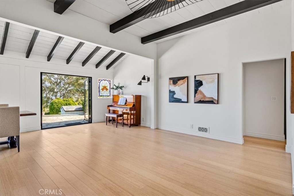 19 Wideloop Road Rolling Hills, CA 90274 - Photo 7 of 35 a view of a livingroom with furniture and a fireplace