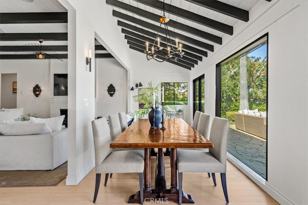 19 Wideloop Road Rolling Hills, CA 90274 - Photo 8 of 35 a view of a dining room with furniture window and wooden floor
