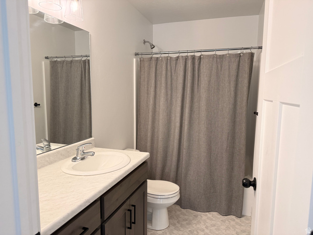 3607 South Parkinson Road South Franklin, ID 83237 - Photo 14 of 24 Full bath featuring vanity and a shower with curtain
