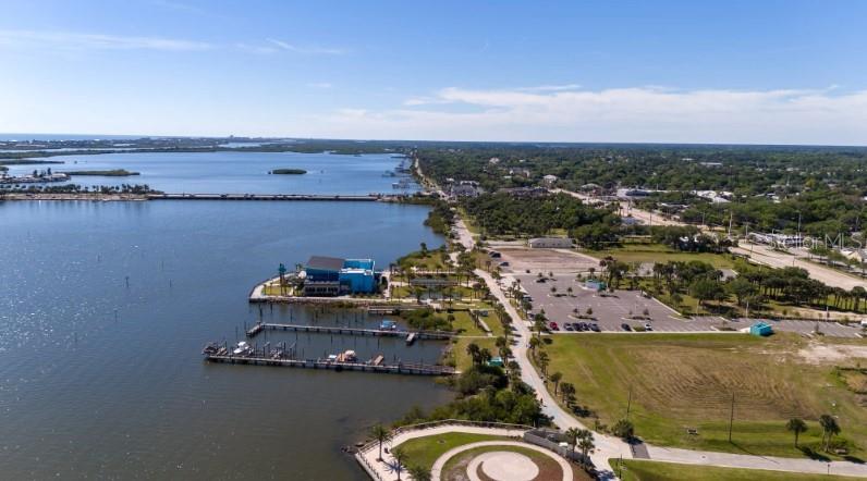 1407 Needle Palm Drive Edgewater, FL 32132 - Photo 22 of 28 an aerial view of a residential houses with outdoor space