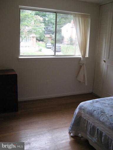 5503 Callander Drive Springfield, VA 22151 - Photo 11 of 28 a bedroom with a bed and a window