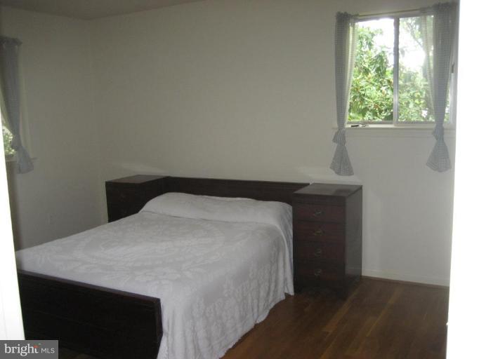 5503 Callander Drive Springfield, VA 22151 - Photo 16 of 28 a bedroom with a bed and a window