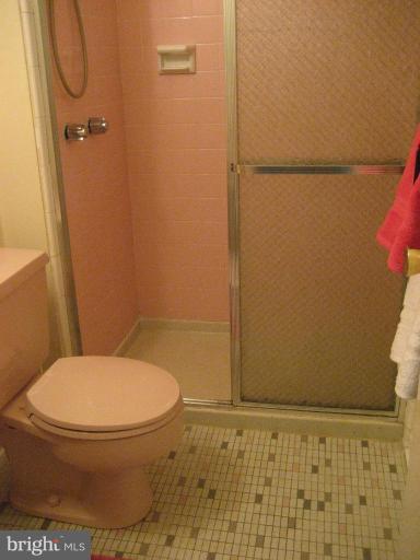 5503 Callander Drive Springfield, VA 22151 - Photo 19 of 28 a bathroom with a toilet and a shower