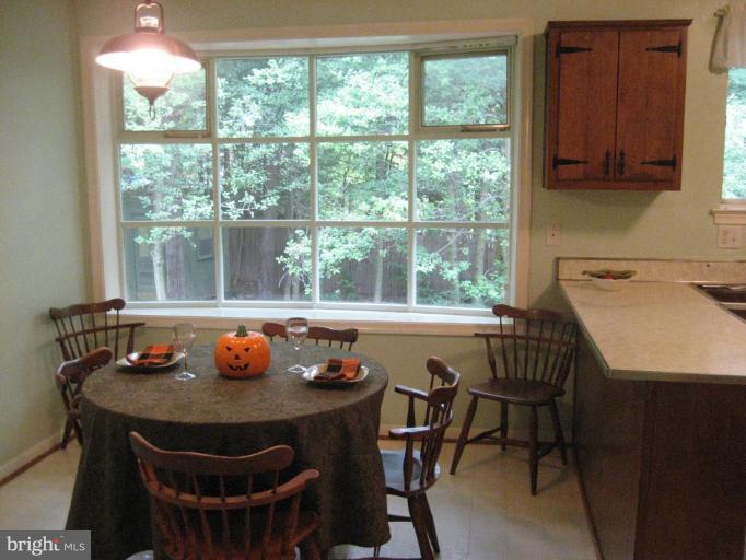 5503 Callander Drive Springfield, VA 22151 - Photo 3 of 28 a view of a dining room with furniture and window