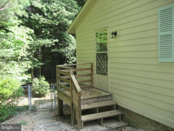 5503 Callander Drive Springfield, VA 22151 - Photo 24 of 28 a view of outdoor space and deck