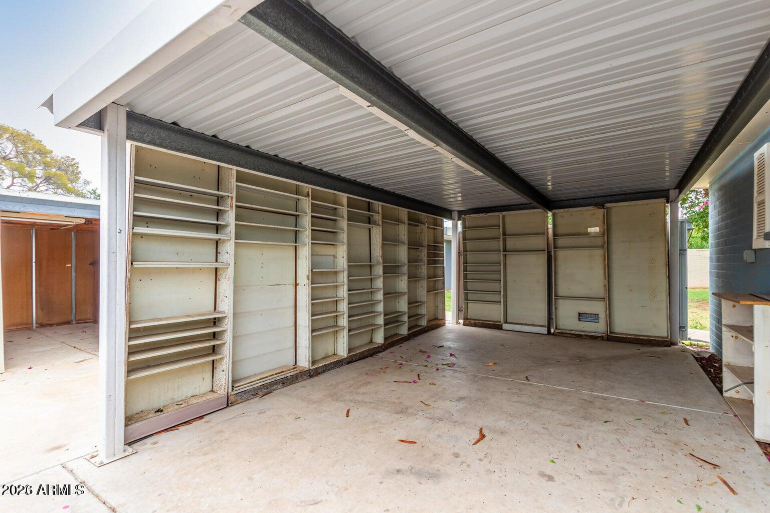 7340 North 7th Avenue Phoenix, AZ 85021 - Photo 32 of 37 an empty room with closet and windows