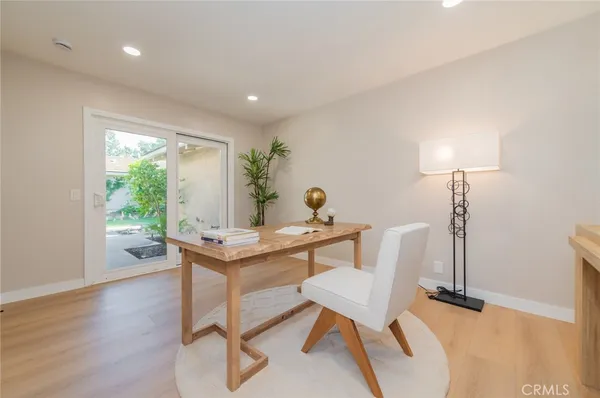 a room with furniture and a window