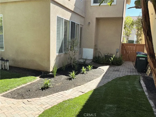 a front view of a house having yard
