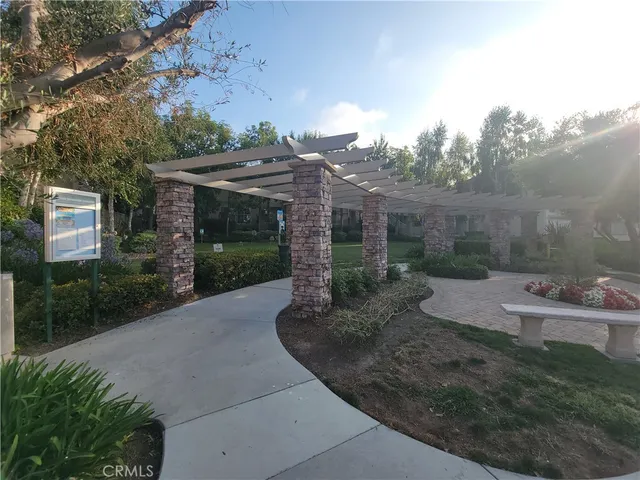 a view of a house with a yard and garage