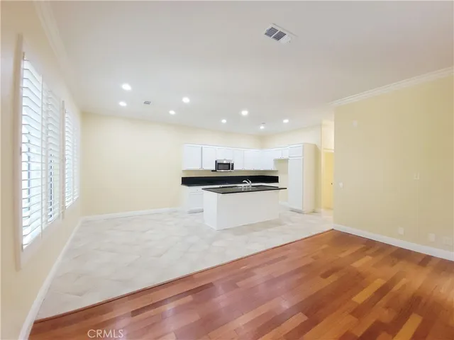a view of kitchen with wooden floor