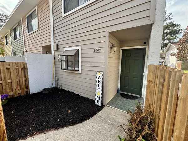 a view of a back yard of the house