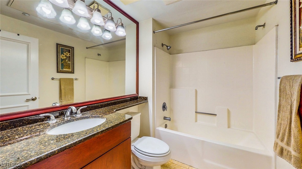 260 East Flamingo Road, Unit 229 Las Vegas, NV 89169 - Photo 17 of 31 Full bath featuring washtub / shower combination and vanity