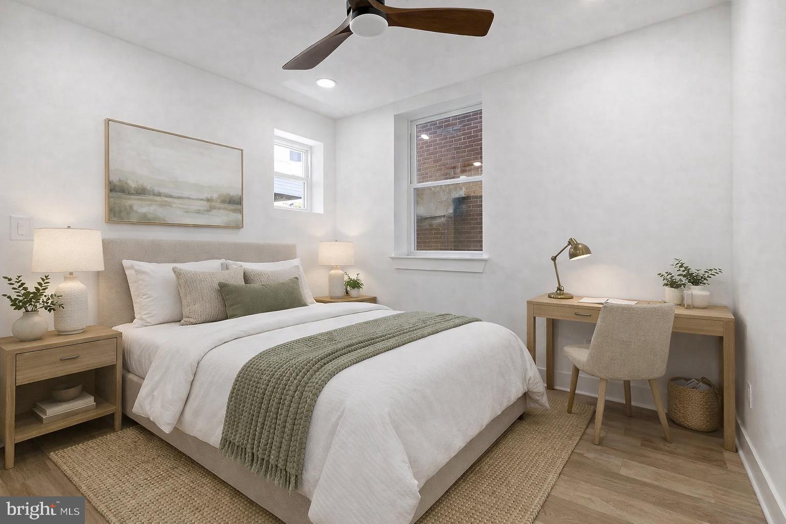 1502 South 52nd Street, Unit A Philadelphia, PA 19143 - Photo 7 of 13 a bedroom with bed and window