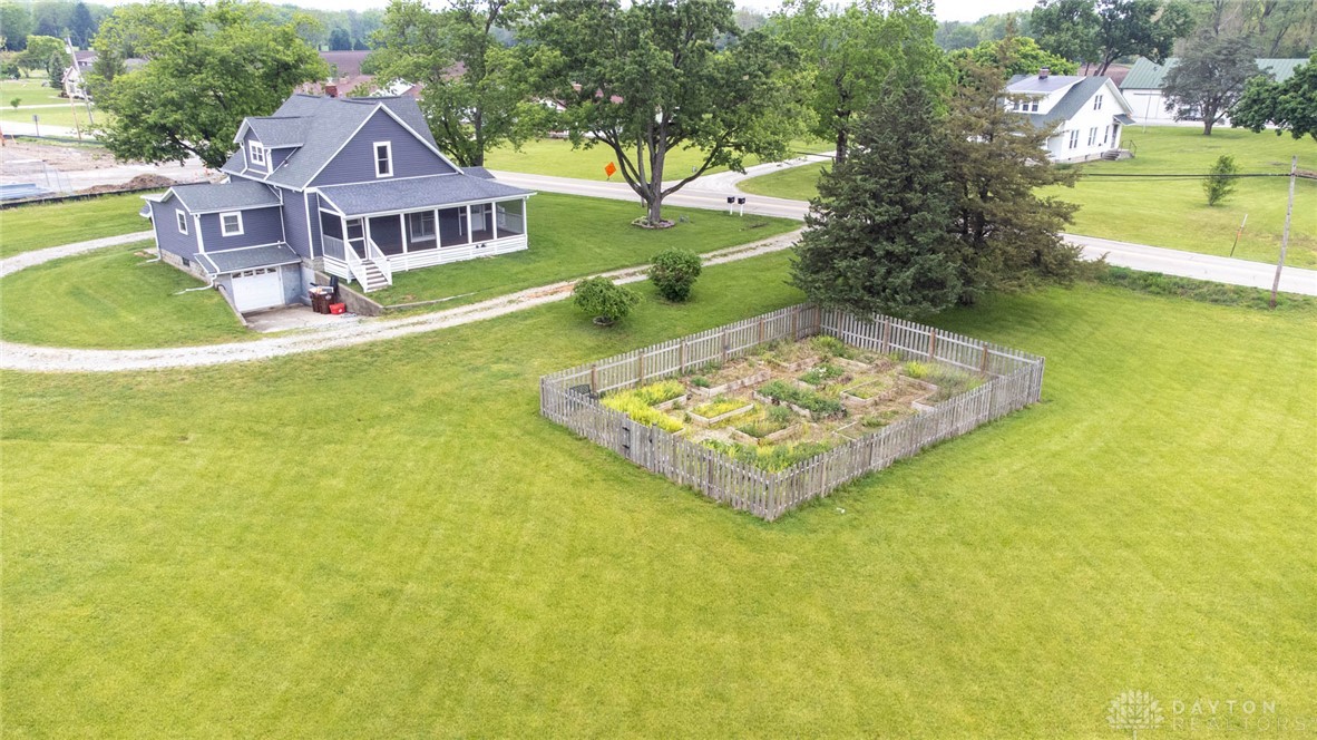 190 Swailes Road Troy, OH 45373 - Photo 56 of 82 This charming home offers a sprawling yard, perfect for outdoor activities and gardening.