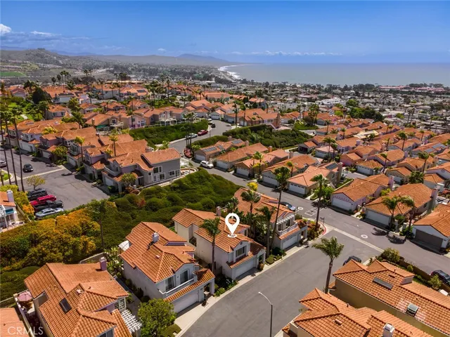 an aerial view of a city with lots of residential buildings
