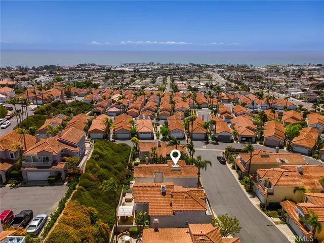 an aerial view of a city with lots of residential buildings