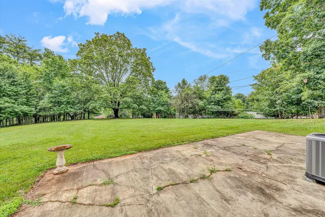a view of a golf course with a lake