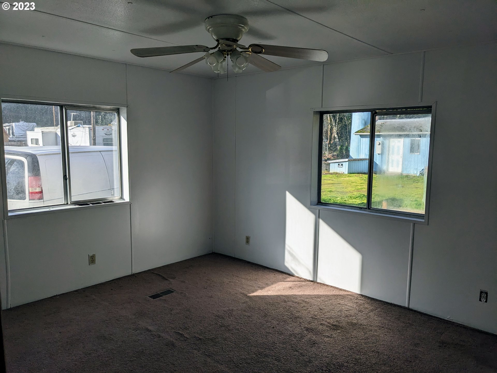 32905 James Street, Unit 20 Scappoose, OR 97056 - Photo 4 of 8 a view of an empty room with a window