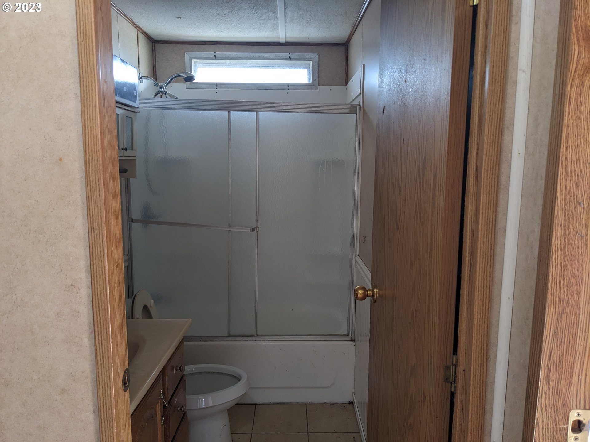 32905 James Street, Unit 20 Scappoose, OR 97056 - Photo 6 of 8 a bathroom with a toilet and a shower