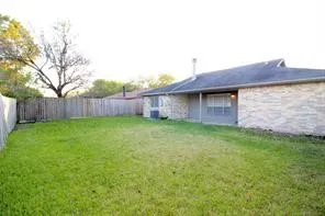 a view of a backyard with a garden