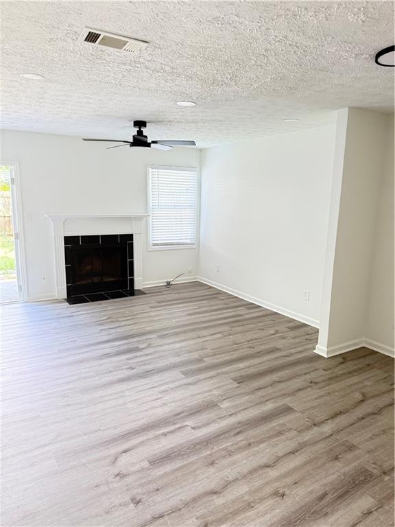 2356 Cove Road Lithonia, GA 30058 - Photo 12 of 20 a view of empty room with wooden floor and fireplace