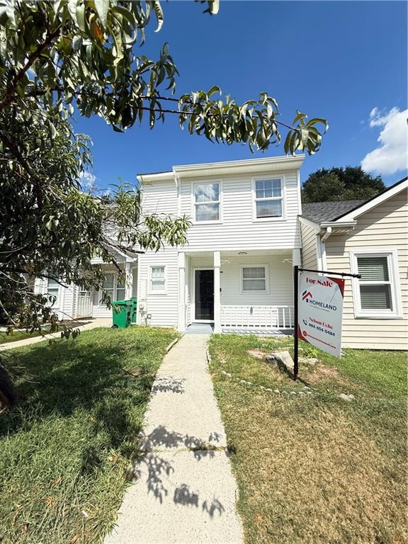 2356 Cove Road Lithonia, GA 30058 - Photo 20 of 20 a front view of a house with a garden