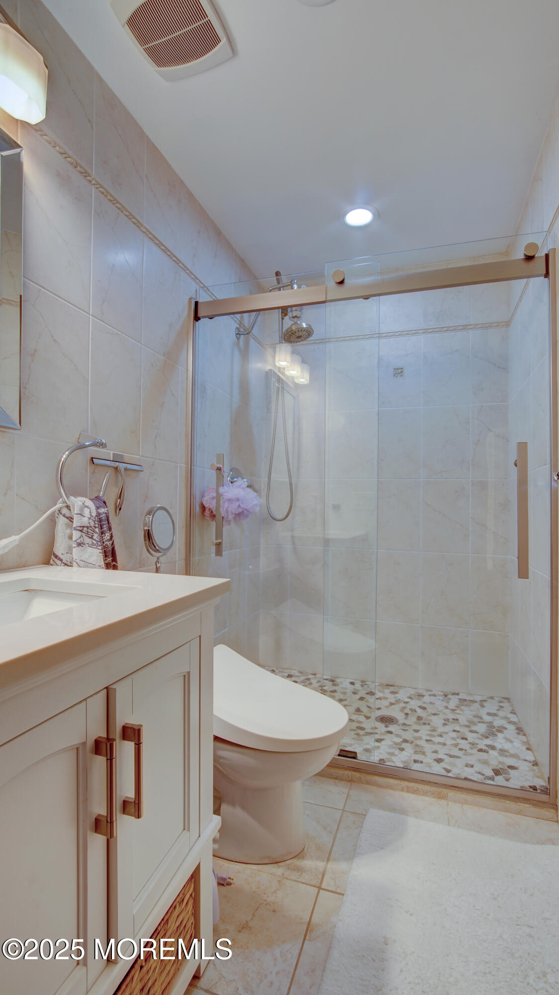 141 Chestnut Way, Unit 141 Manalapan, NJ 07726 - Photo 26 of 46 a bathroom with a shower and a sink