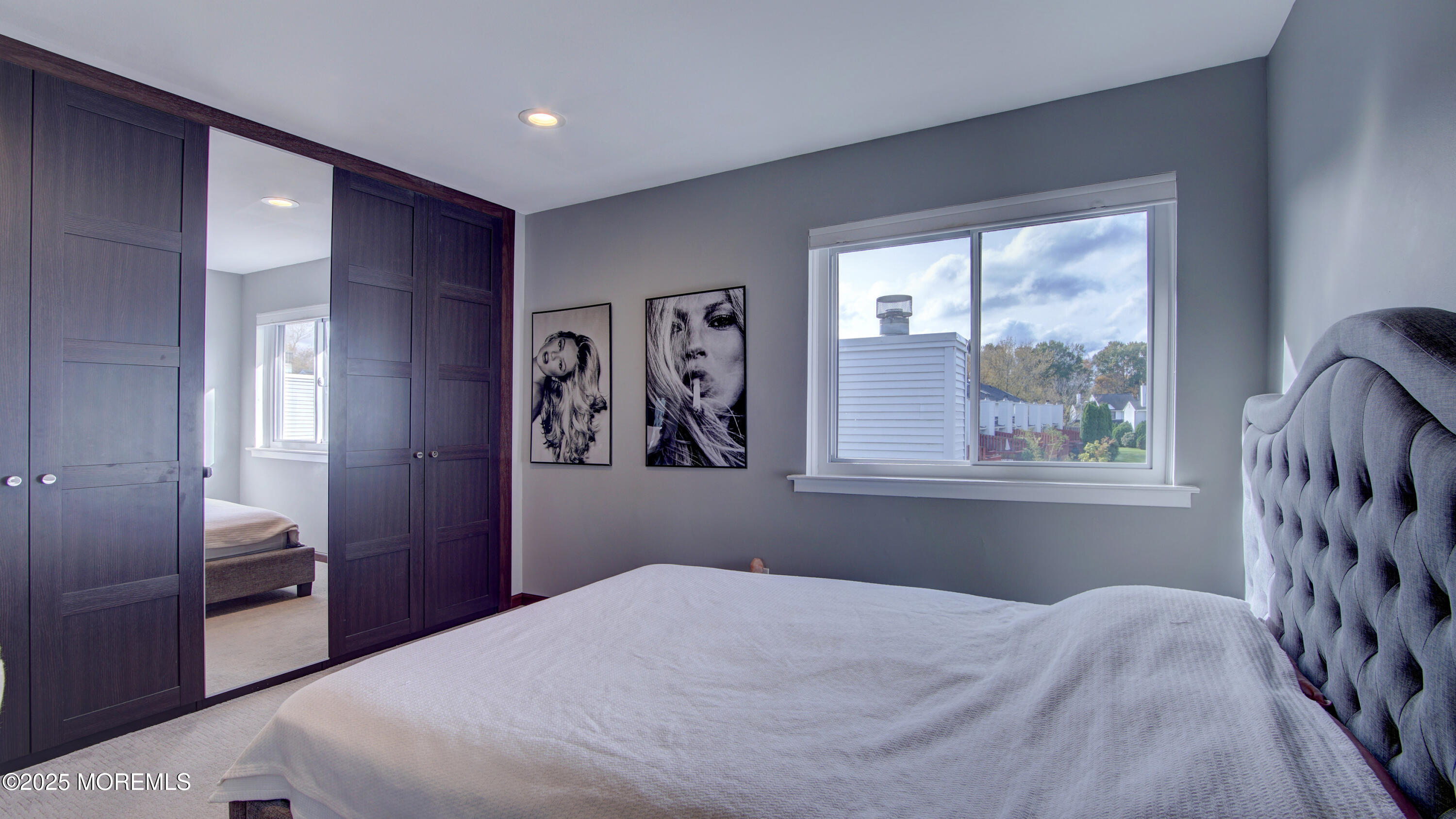 141 Chestnut Way, Unit 141 Manalapan, NJ 07726 - Photo 30 of 46 a bedroom with a bed and a window