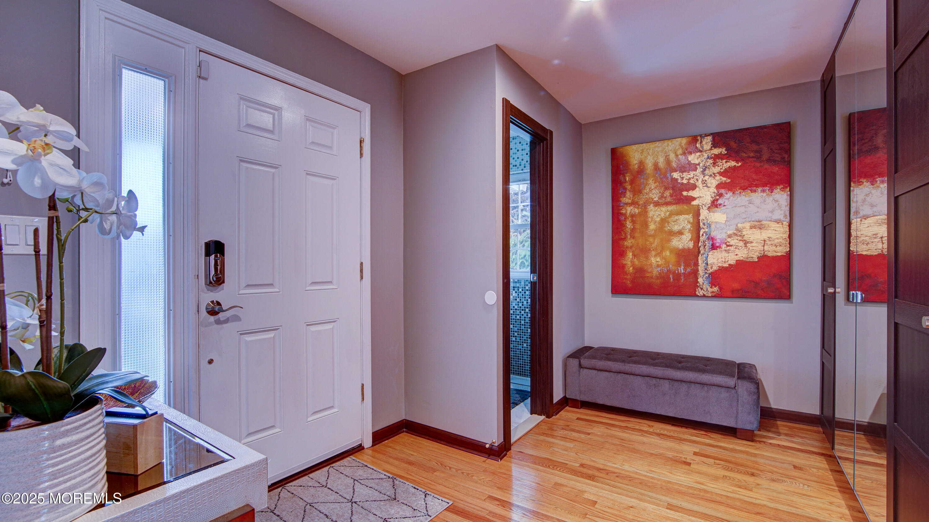 141 Chestnut Way, Unit 141 Manalapan, NJ 07726 - Photo 3 of 46 a bedroom with a bed and a window