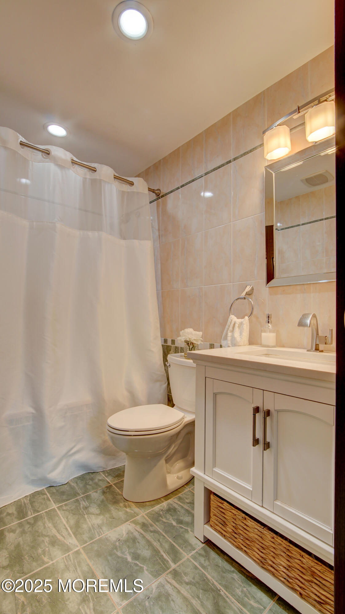 141 Chestnut Way, Unit 141 Manalapan, NJ 07726 - Photo 33 of 46 a bathroom with a sink toilet and shower