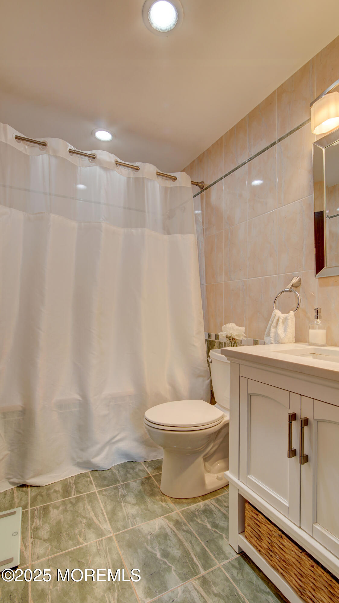 141 Chestnut Way, Unit 141 Manalapan, NJ 07726 - Photo 34 of 46 a bathroom with a sink toilet and shower