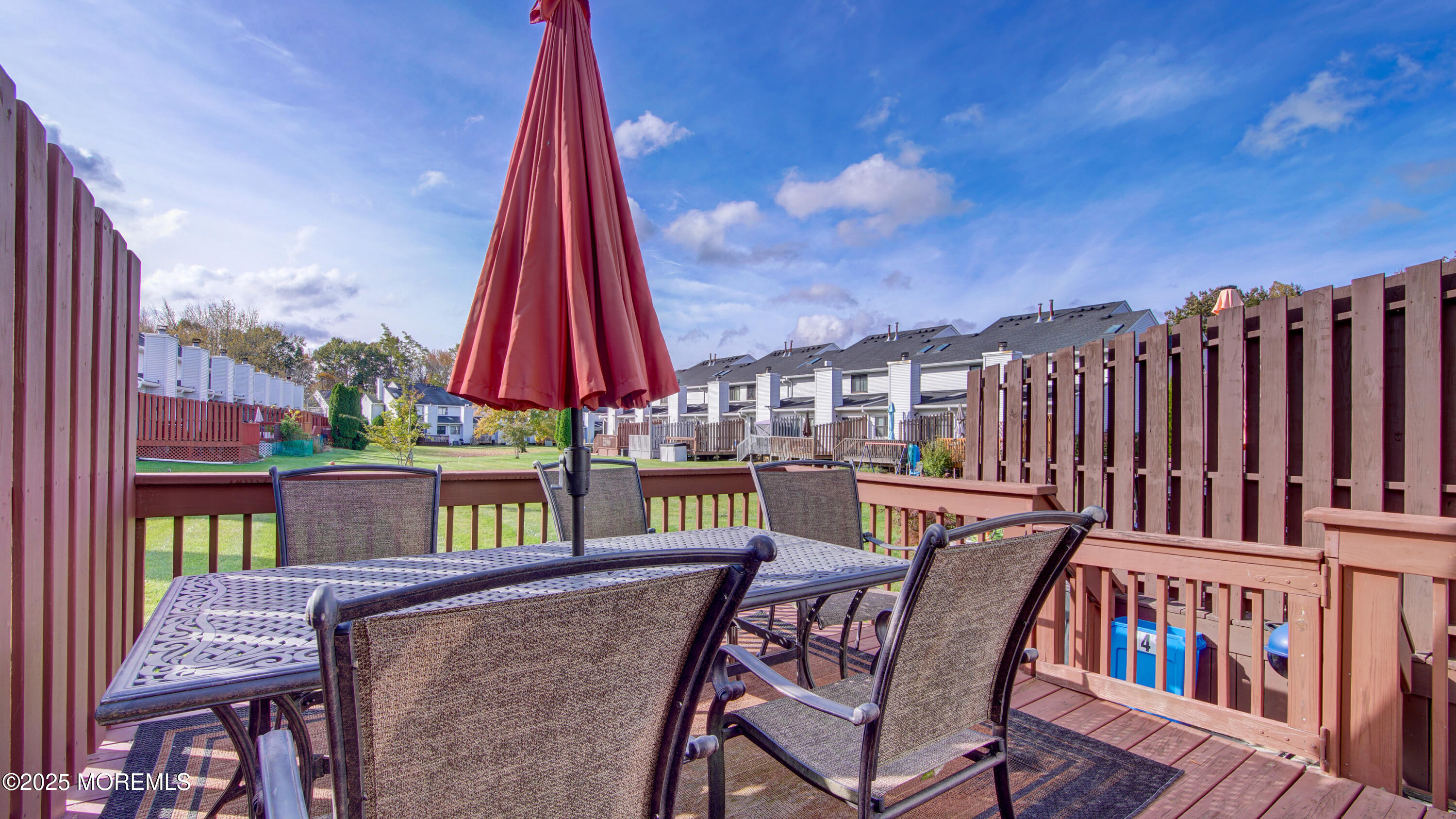 141 Chestnut Way, Unit 141 Manalapan, NJ 07726 - Photo 40 of 46 a view of a chairs and table in the balcony