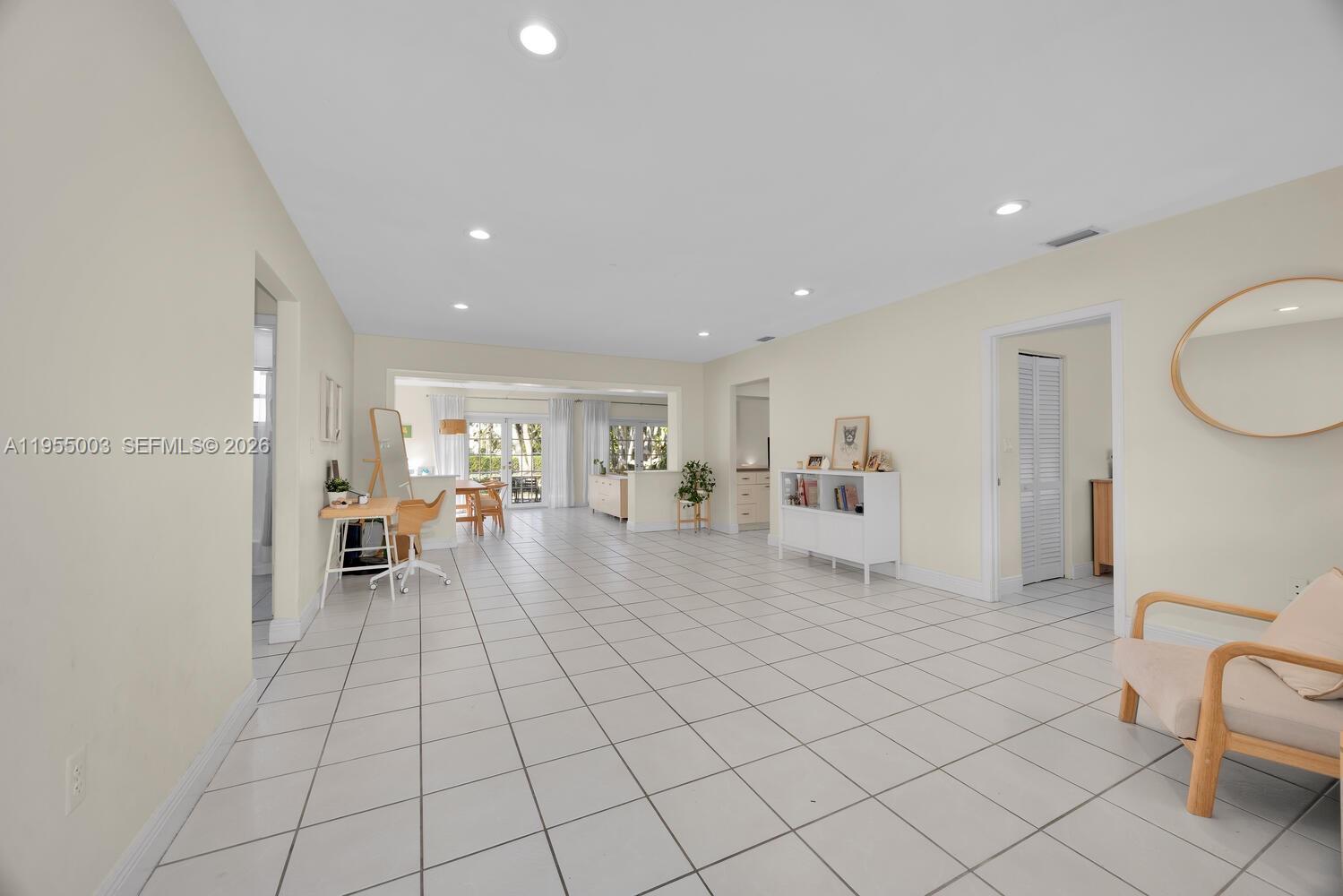 8230 Southwest 63rd Place Miami, FL 33143 - Photo 4 of 24 a view of a livingroom with furniture and a couch