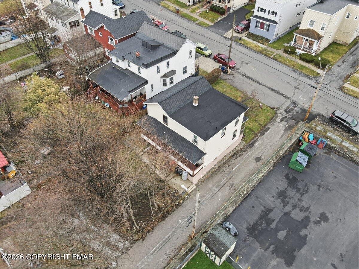 515 Breck Street Scranton, PA 18505 - Photo 12 of 38 an aerial view of a house with a yard