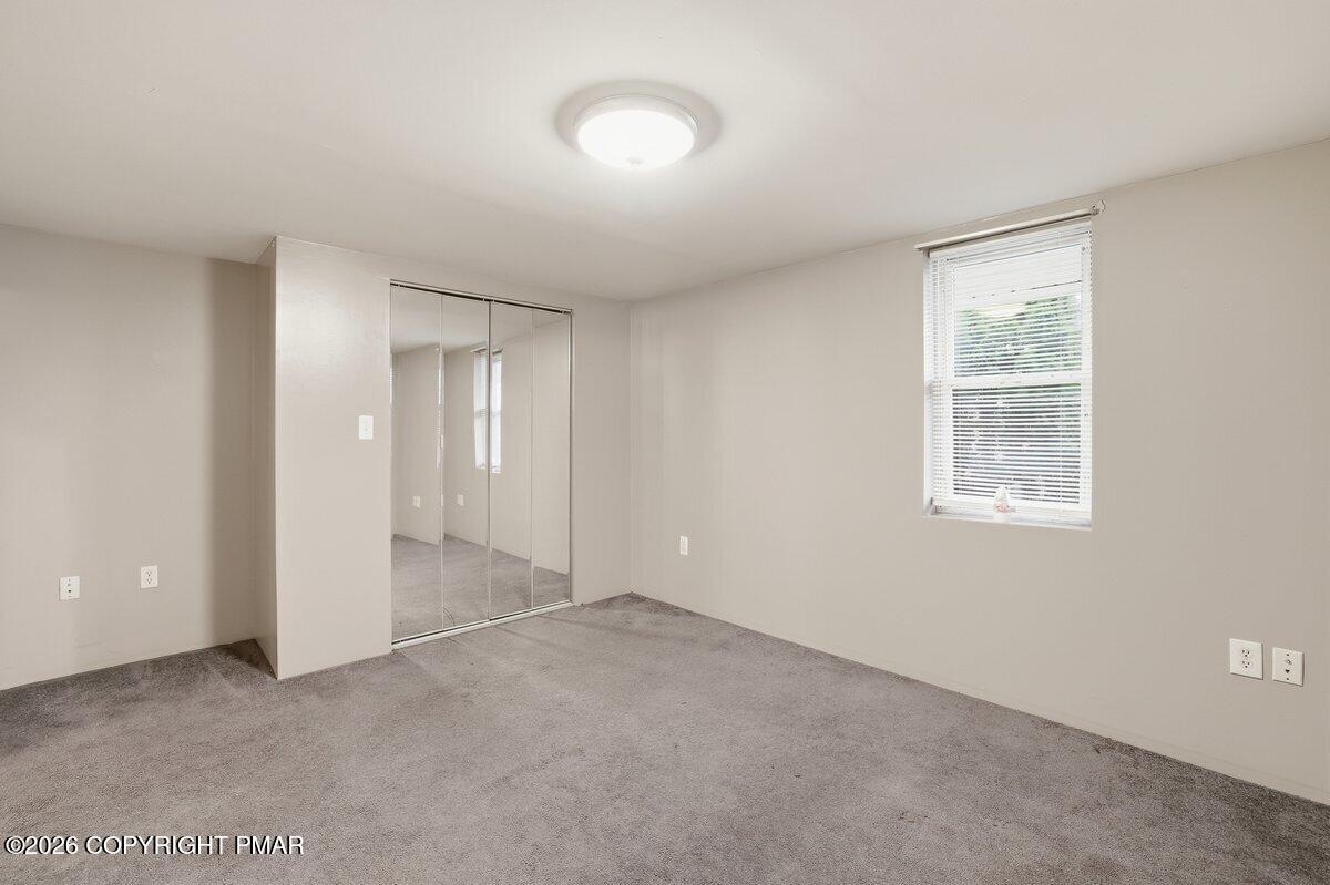 515 Breck Street Scranton, PA 18505 - Photo 21 of 38 a view of an empty room with a window