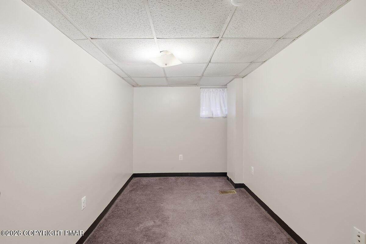 515 Breck Street Scranton, PA 18505 - Photo 23 of 38 an empty room with a empty space and a window